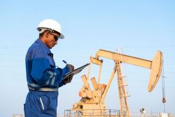 Field,Engineer,Monitoring,Crude,Oil,Pump,In,The,Oilfield.