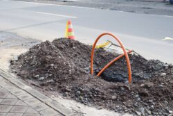 Construction,Site,Featuring,An,Open,Trench,For,Fiber,Optic,Cable
