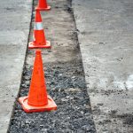 Repair,Pothole,In,Asphalt,Pavement,,Road,Work,Warning,Cones.,Roadwork,
