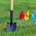 Buried,Electric,,Natural,Gas,And,Water,Utility,Warning,Flag,With